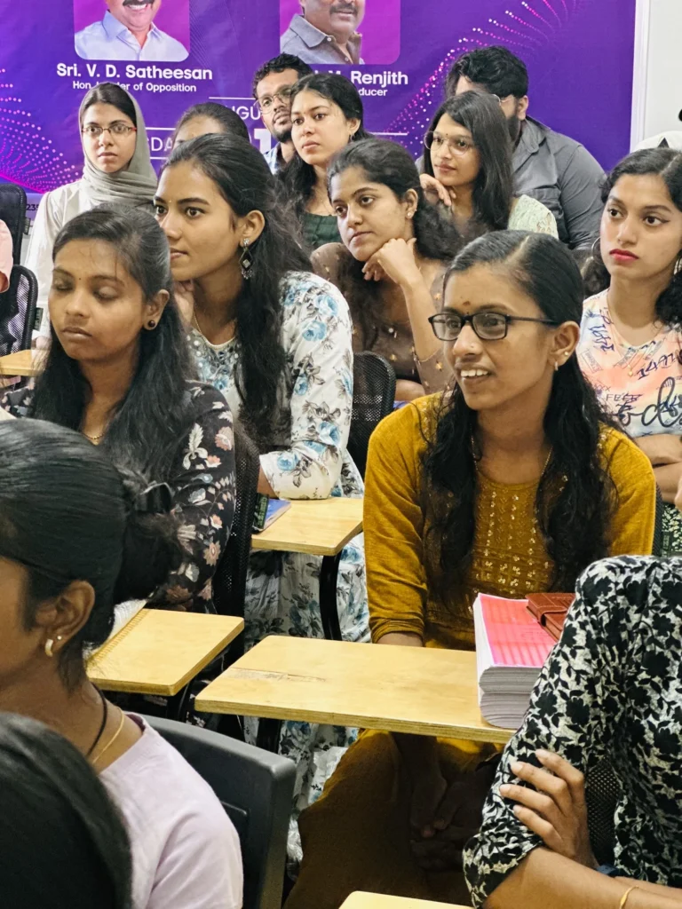 Students listening attentively during a skill development workshop at Logic Y